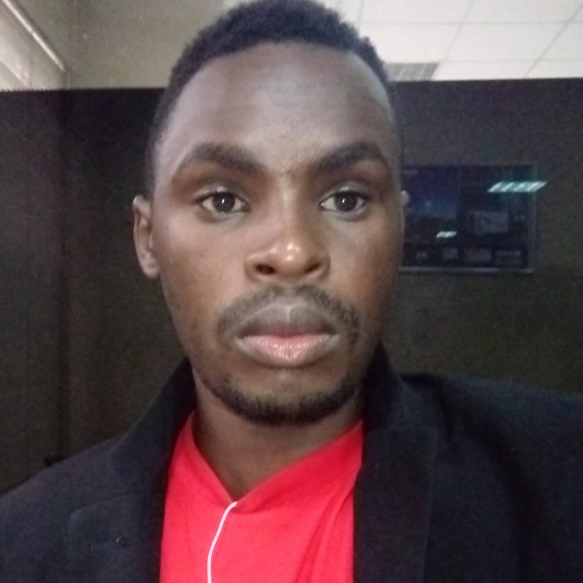 SIMON  MACHARIA 
