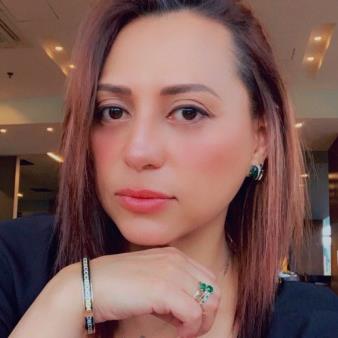 Aura E. Yanes