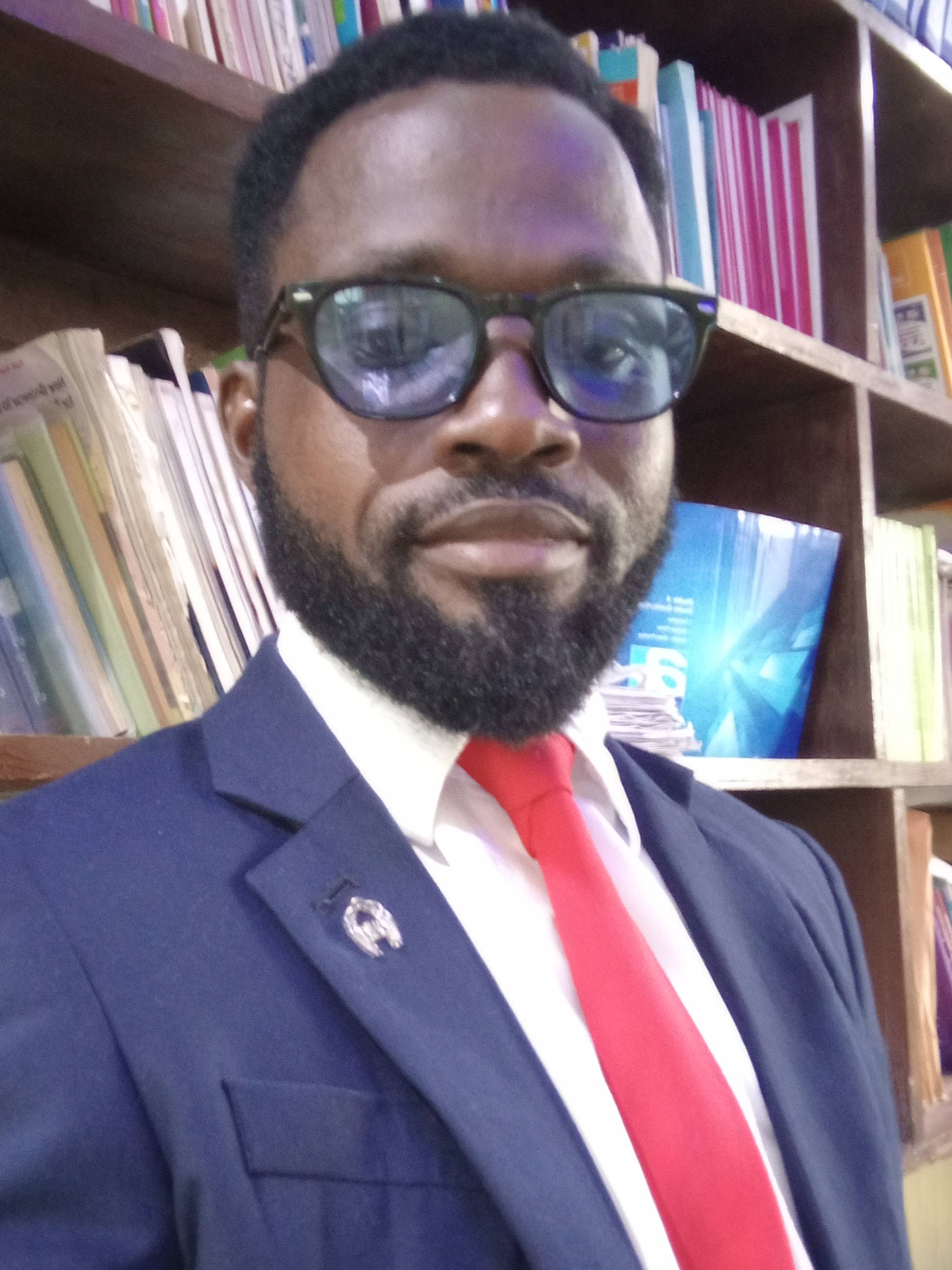 JOHN KOFI AMENYO